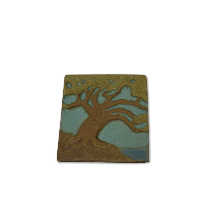 Clay Tile of a Torrey Pine tree by the shore created by Laird Plumleigh