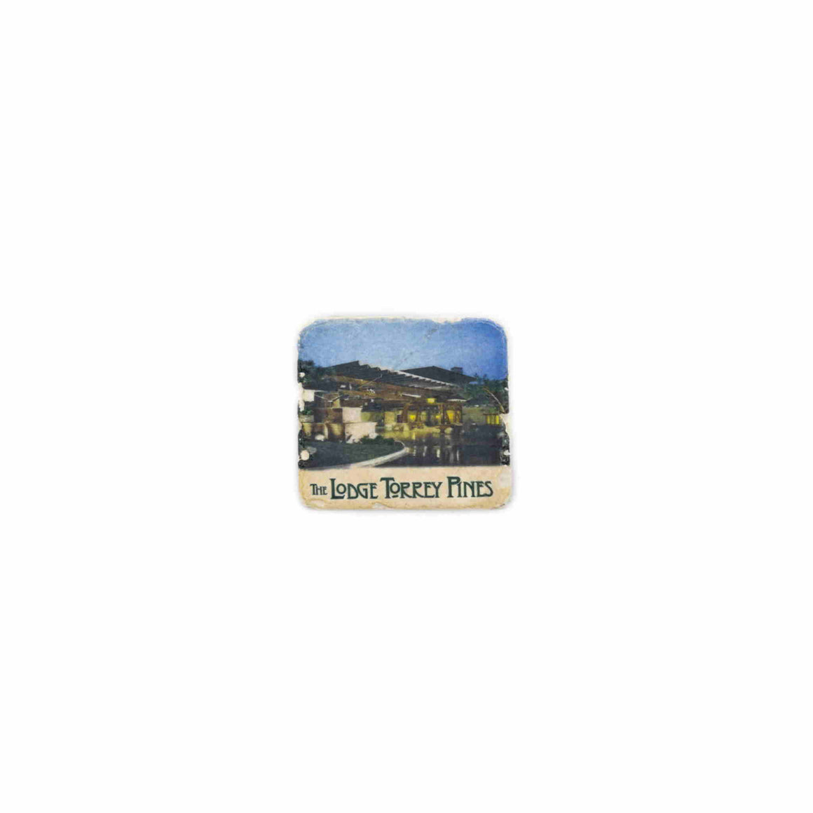 Tumbled marble magnets with three scenes from The Lodge at Torrey Pines.